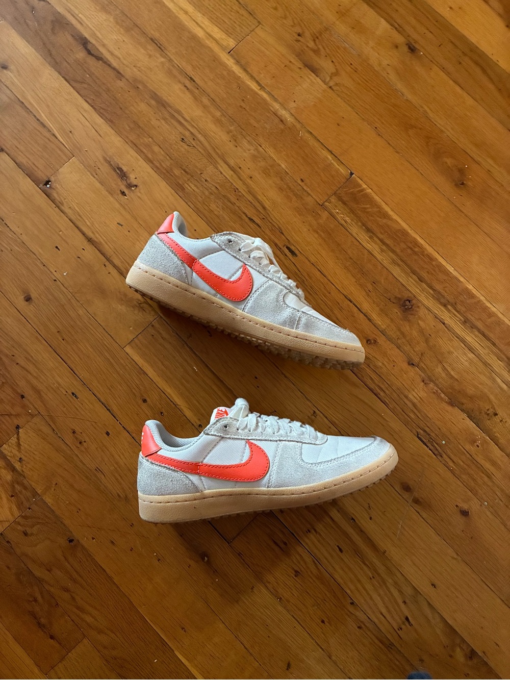 Nike Coral Swoosh Low-Top Sneakers on off white Upper